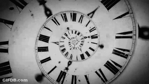 Black And White Spiral Clock Roman Numerals GIF