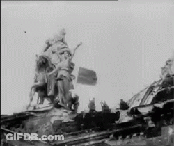 Black And White Statue On Building GIF