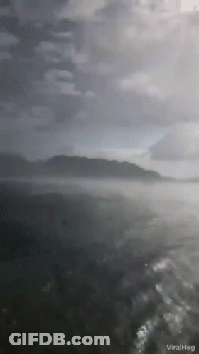 Black And White Stormy Sky Over Water GIF