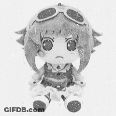 Black And White Stuffed Doll With Glasses GIF