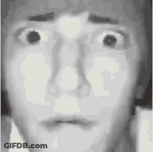 Black And White Surprised Face GIF