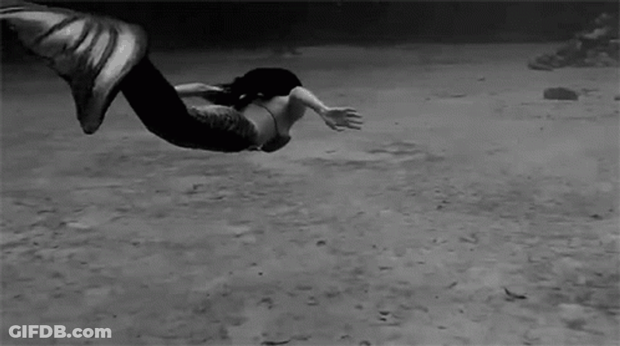 Black And White Swimming Mermaid GIF