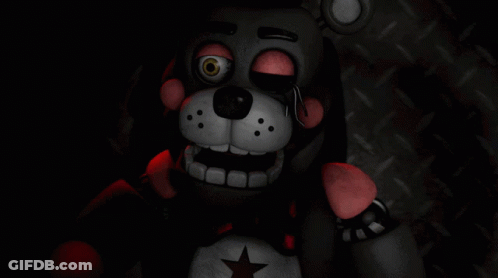 Black And White Teddy Bear With Red Star GIF