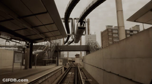 Black And White Train Station With Letter B GIF