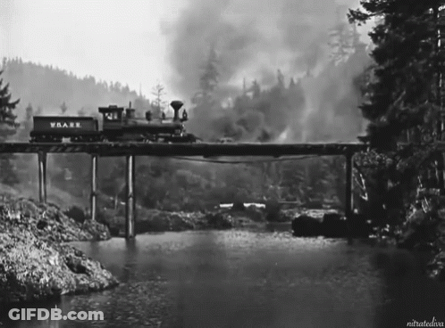 Black And White Train With Wrare On Bridge GIF