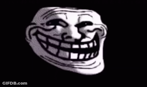 Black And White Troll Face With Large Smile GIF