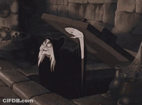 Black And White Witch Coming Out Of Hole GIF