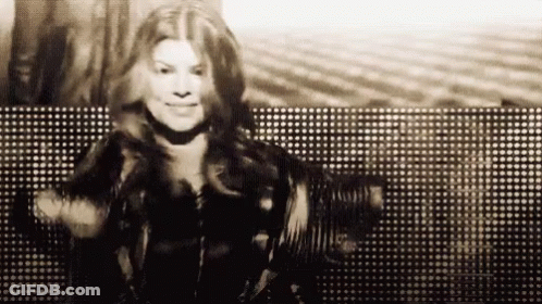 Black And White Woman Dancing In Front Of Lights GIF
