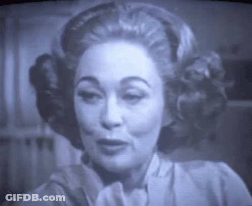 Black And White Woman Face On TV Screen GIF