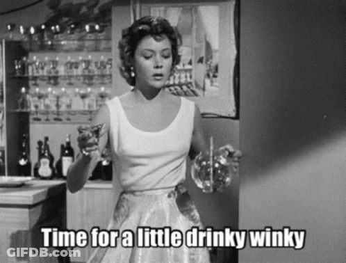 Black And White Woman Holding Glass Saying Time For A Little Drinky Winky GIF