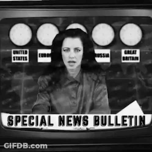 Black And White Woman Holding Special News Bulletin GIF