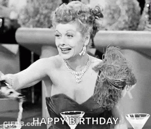 Black And White Woman In Dress With Martini Glasses Saying Happy Birthday GIF