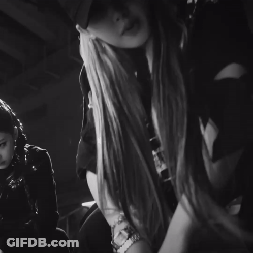 Black And White Woman In Hat And Gucci Veronica Jacket GIF