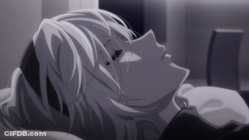 Black And White Woman Laying On Bed GIF