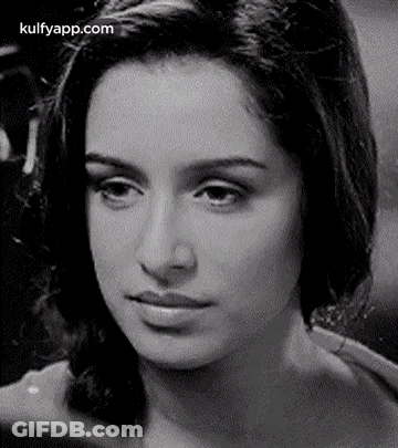 Black And White Woman Looking At Camera GIF