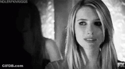 Black And White Woman Looking At Mirror GIF