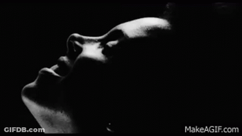 Black And White Woman Open Mouth Dark Room GIF