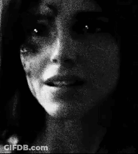 Black And White Woman's Face GIF