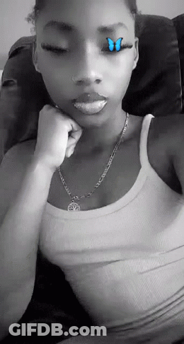 Black And White Woman With Butterfly On Eye GIF