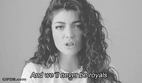 Black And White Woman With Curly Hair And We'll Never Be Royals GIF