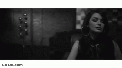 Black And White Woman With Hoop Earrings GIF