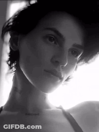 Black And White Woman With Neck Tattoo GIF