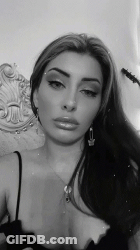Black And White Woman With Necklace GIF