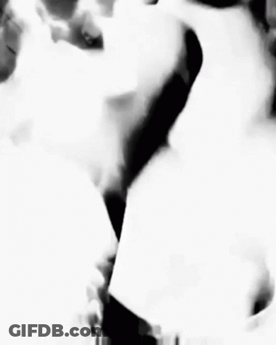 Black And White Woman With Smoke From Mouth GIF