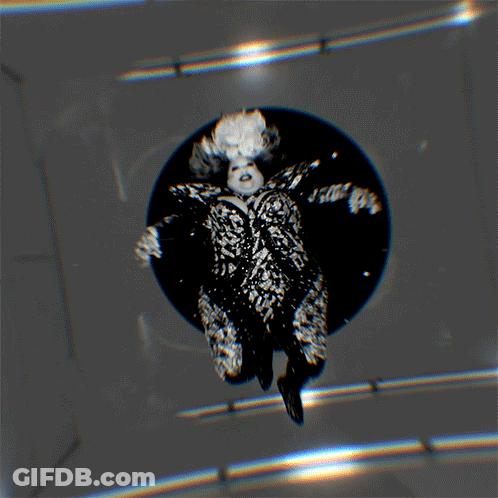 Black And White Woman With Wig GIF