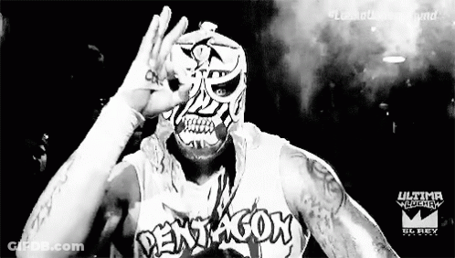 Black And White Wrestler In Mask Making Peace Sign GIF