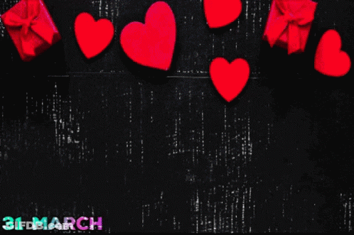 Black Background With Hearts And Gifts 31 March GIF