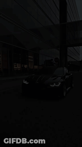 Black BMW Car With Logo On Front GIF