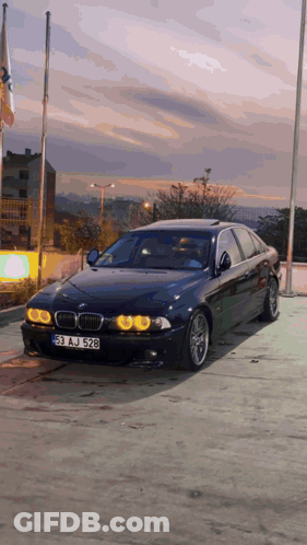 Black BMW With License Plate 53 AJ 528 GIF