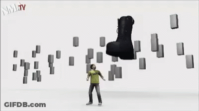 Black Boot Surrounded By Blocks With Text NMTV GIF