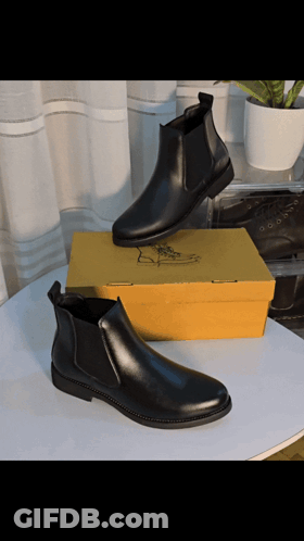 Black Boots Next To Yellow Box GIF
