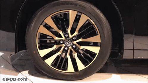 Black Car With Gold Rim And Toyota Logo GIF