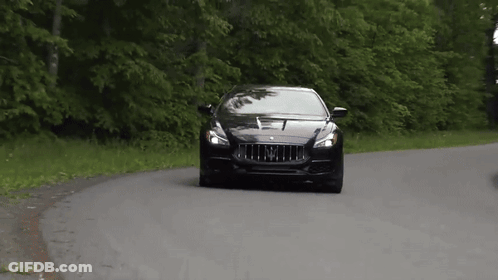 Black Car With Letter M Driving GIF