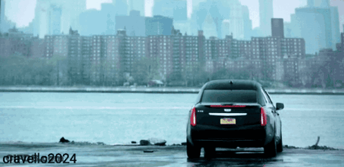 Black Car With New York License Plate On Shore GIF