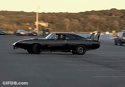 Black Car With Spoiler Driving GIF