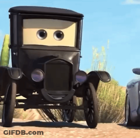 Black Cartoon Car With Big Eyes Driving Down Dirt Road GIF