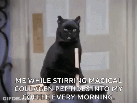 Black Cat Holding Coffee Bottle GIF