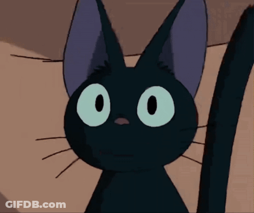 Black Cat With Green Eyes And Purple Ears GIF