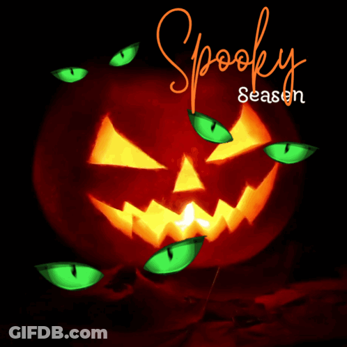 Black Cat With Pumpkin And Happy Halloween Sign GIF
