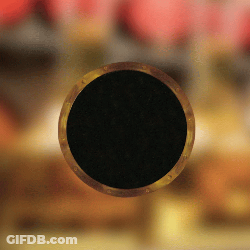 Black Circle With Gold Border Floating GIF