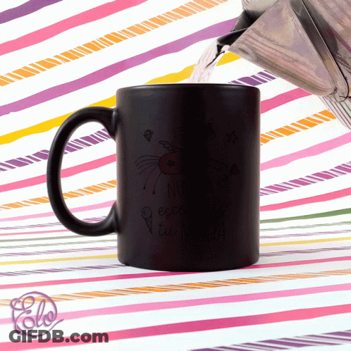 Black Coffee Mug Saying Nunca Excedas Tu Magia GIF