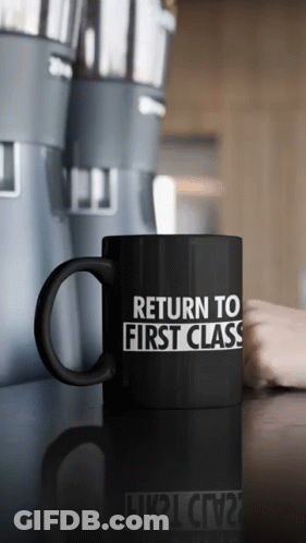 Black Coffee Mug Says Return To First Class GIF