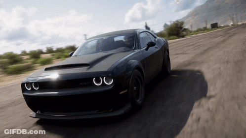 Black Dodge Challenger Driving Down Road GIF