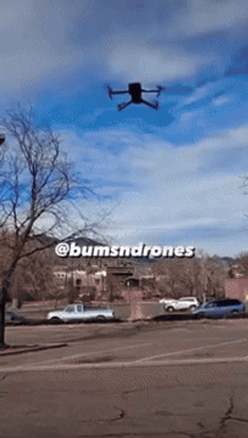 Black Drone Flying GIF