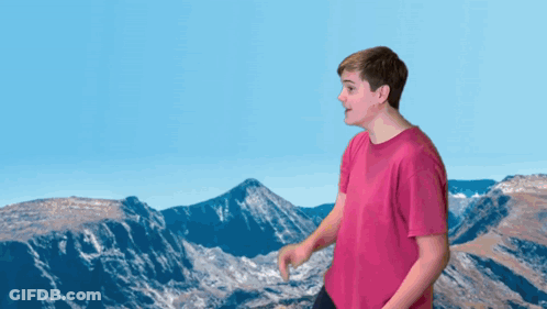 Black Dumbbell On Pile Of Rocks In Desert GIF