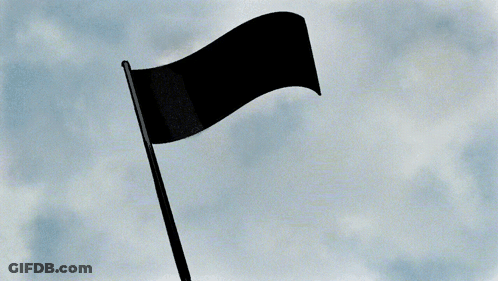 Black Flag Flying In Wind With Cloudy Sky GIF
